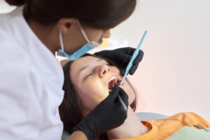 woman in dental chair getting dental work done